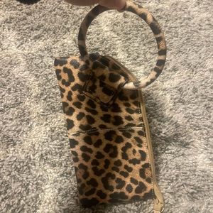 Boutique Cheetah print wristlet never used